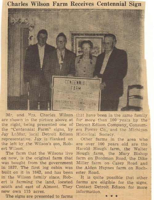 Charles and Maggie Wilson and son Robert M. Wilson receive the Centennial Farm Award