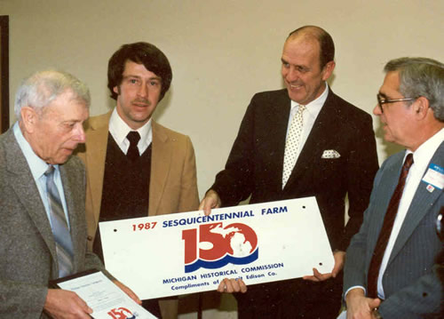 Robert M. and Robert C. Wilson receive the Sesquicentennial Farm Award